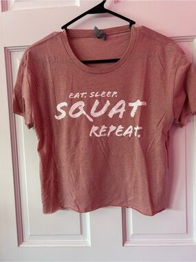 Next Level Apparel Mauve Pink Crop Top with White Slogan